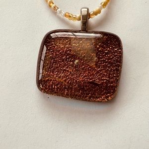 Rusty orange pendant necklace